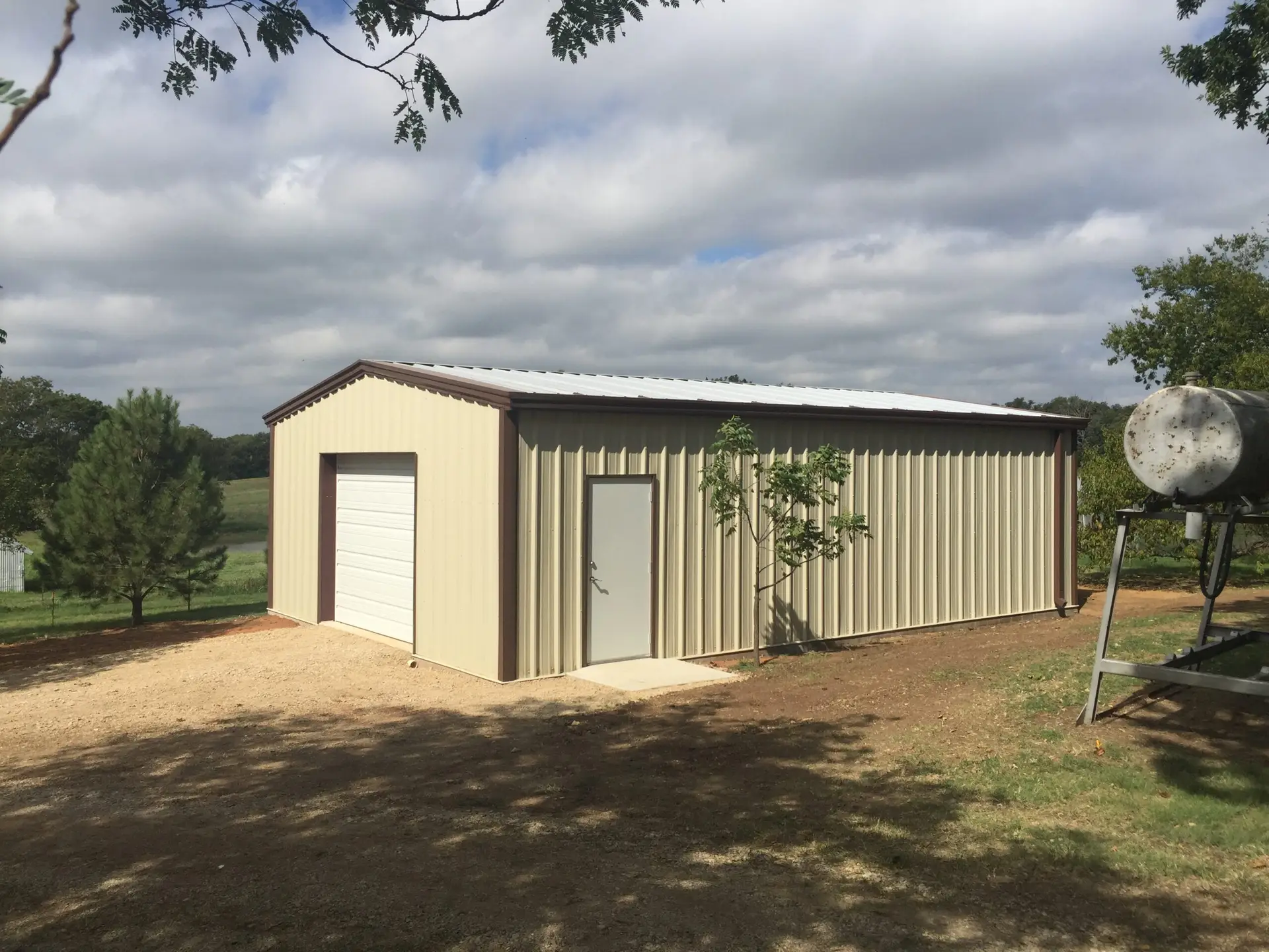 Prefab metal building structure and clear-span interior for agricultural or commercial use.